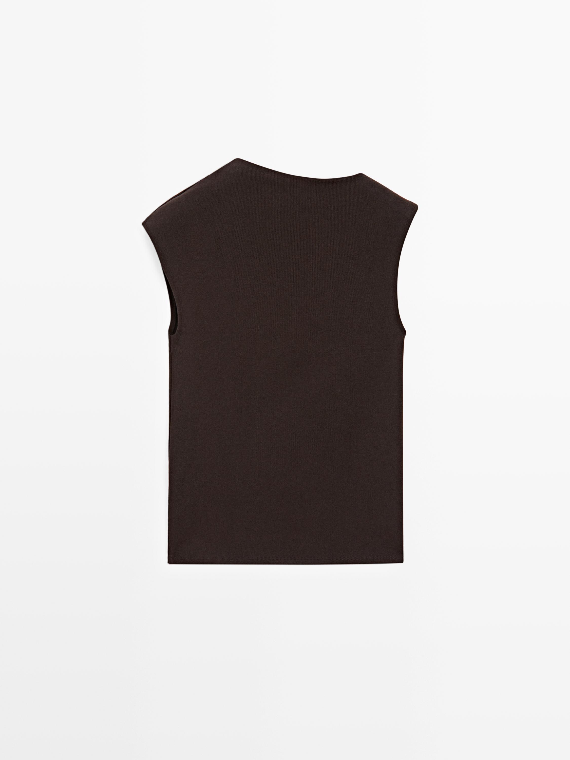 Asymmetric top with brooch detail